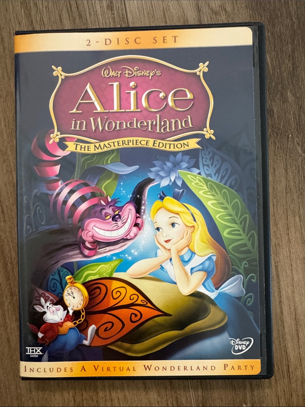 Disney Alice in Wonderland DVD — Blue, Pink, Yellow
